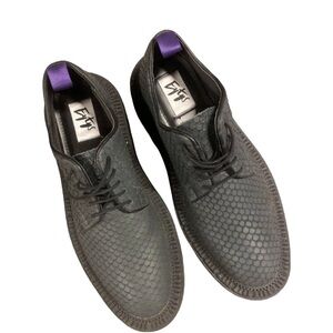 The Eytys Detroit Derby shoes in a black scale-textured leather